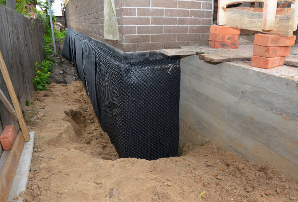 Happy homeowners after waterproofing job in Nauvoo